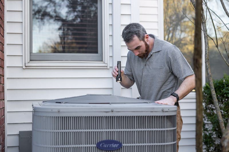 Cal Climate Corp technician performing scheduled commercial HVAC maintenance