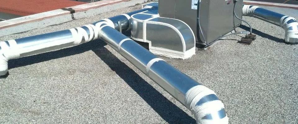 Custom sheet metal ductwork fabricated and installed by Cal Climate Corp