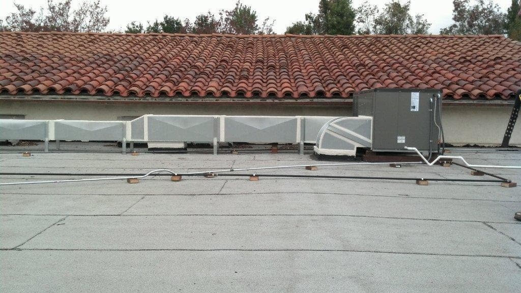 Rooftop commercial HVAC units serviced by Cal Climate Corp in Los Angeles